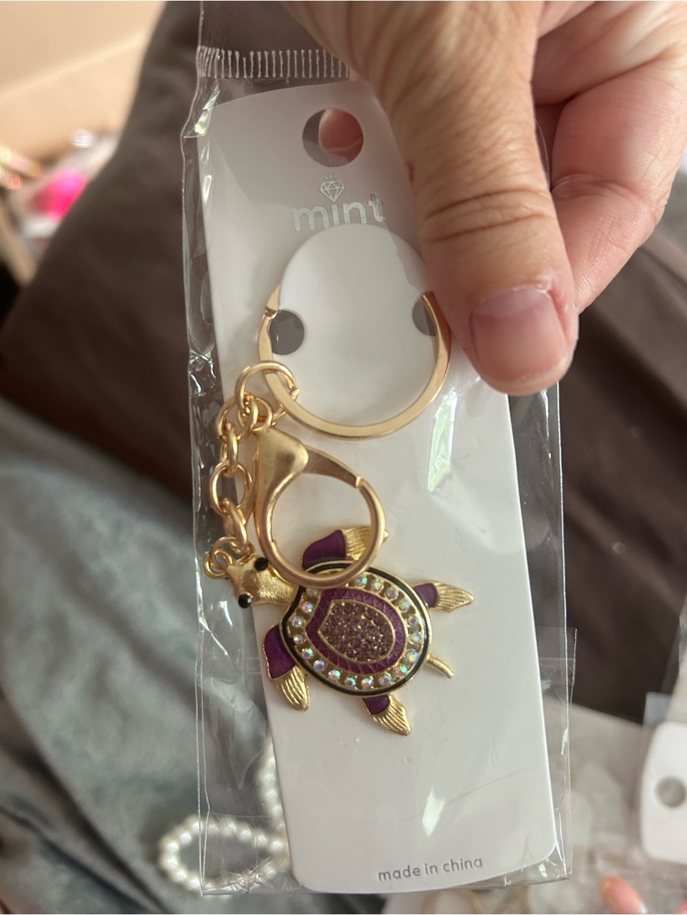 4/$50 Mint Gold Turtle Keychain with Purple Accents